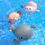 Three cartoonish animal toys floating on blue water