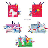 Colorful soft book with unicorn illustrations on a white background