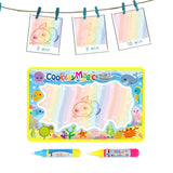 Colorful water magic drawing paper with markers and ocean-themed border on a white background