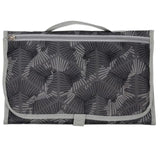 Foldable shopping bag with geometric pattern.