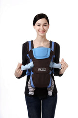 Woman wearing a baby carrier with a baby inside