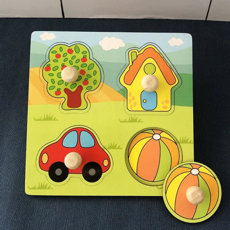 Children's shape puzzle with car, house, tree, and ball shapes