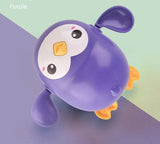 Purple penguin-shaped toy.