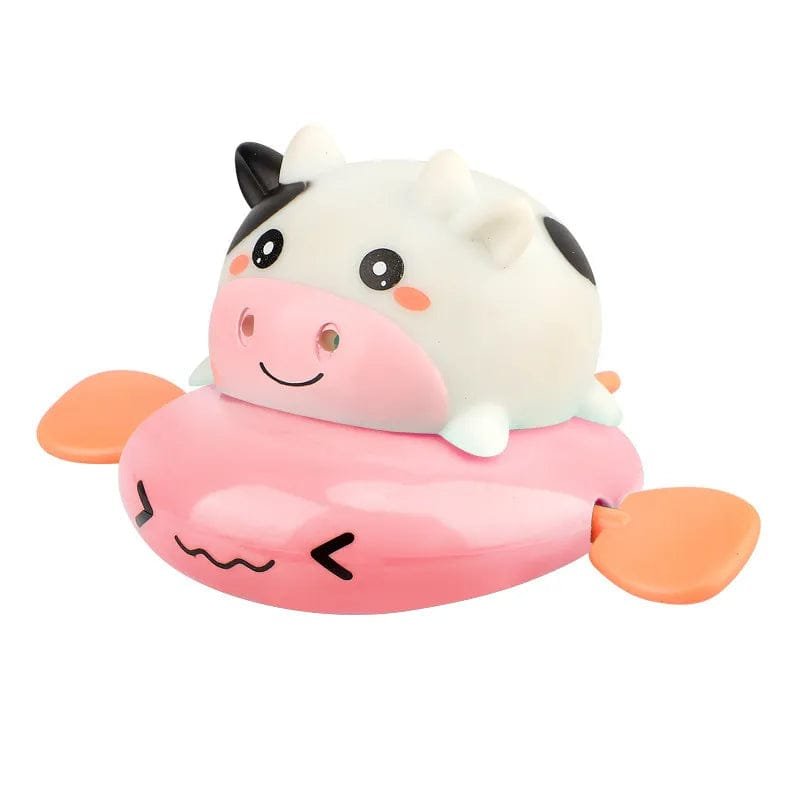 Cute cartoon cow toy with a pink floaty.