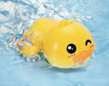 Yellow rubber duck with a happy face in water