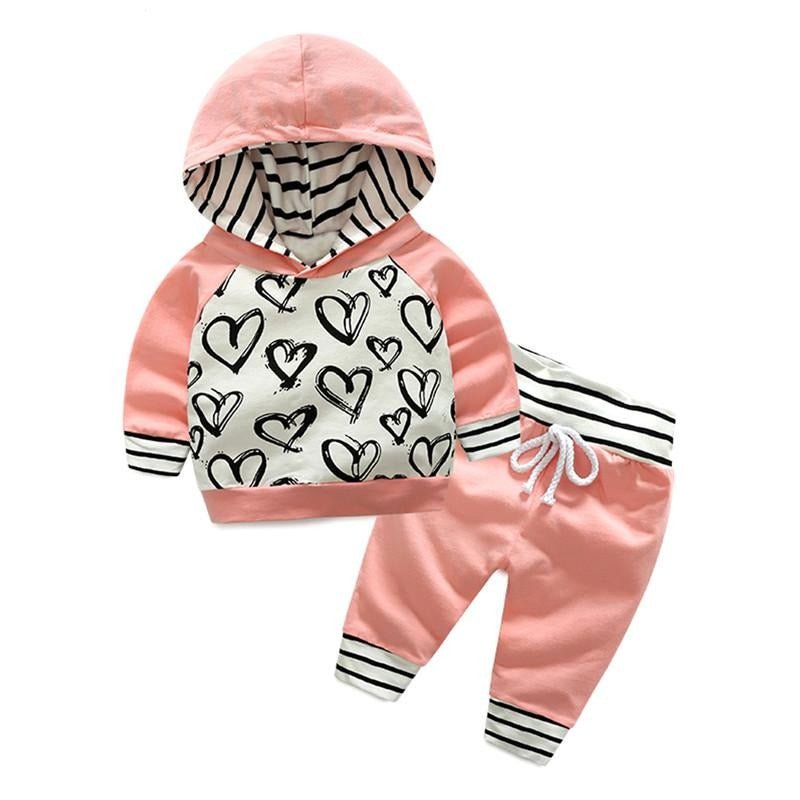 Children's pink hoodie and pants set with heart patterns 