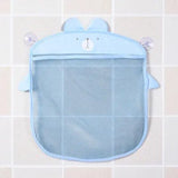 Blue mesh pouch with bear design on a tiled wall