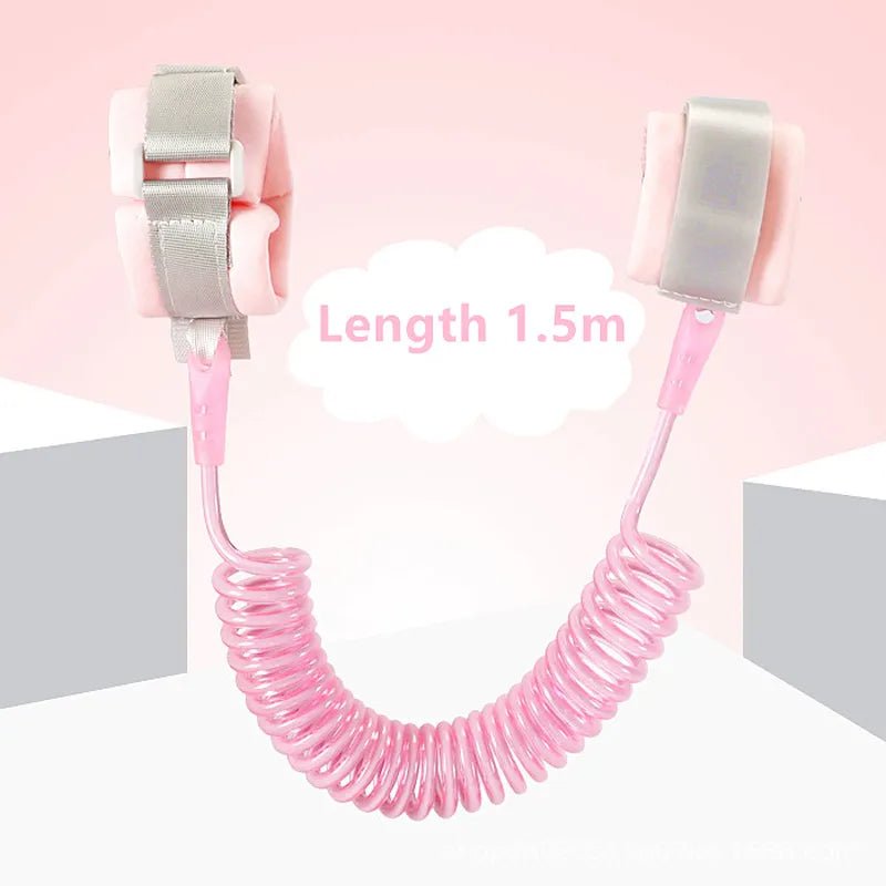 Pink anti-lost child leash with metal clips.
