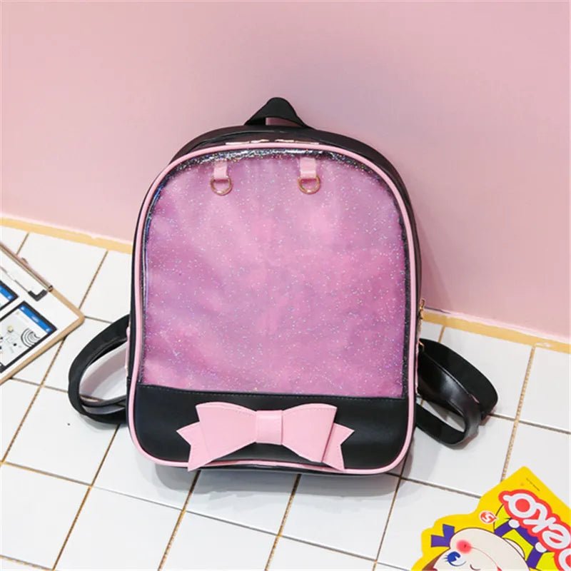 Pink and black backpack with a bow 