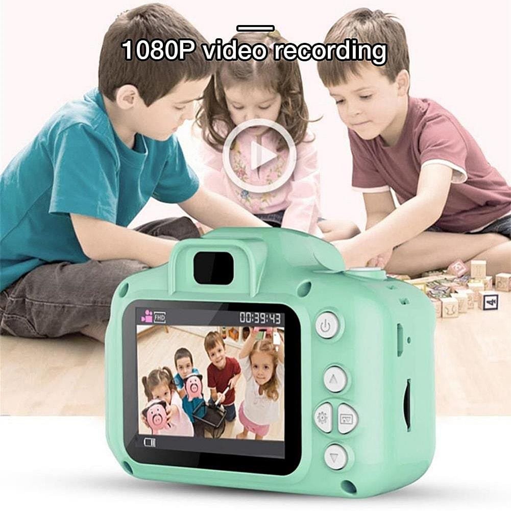 Children playing with a green toy camera displaying a video on its screen.