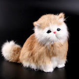 Plush toy cat with brown and white fur.