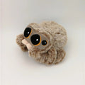 Plush toy sloth with large eyes