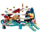 Toy race track set with cars and dinosaur-themed obstacles.