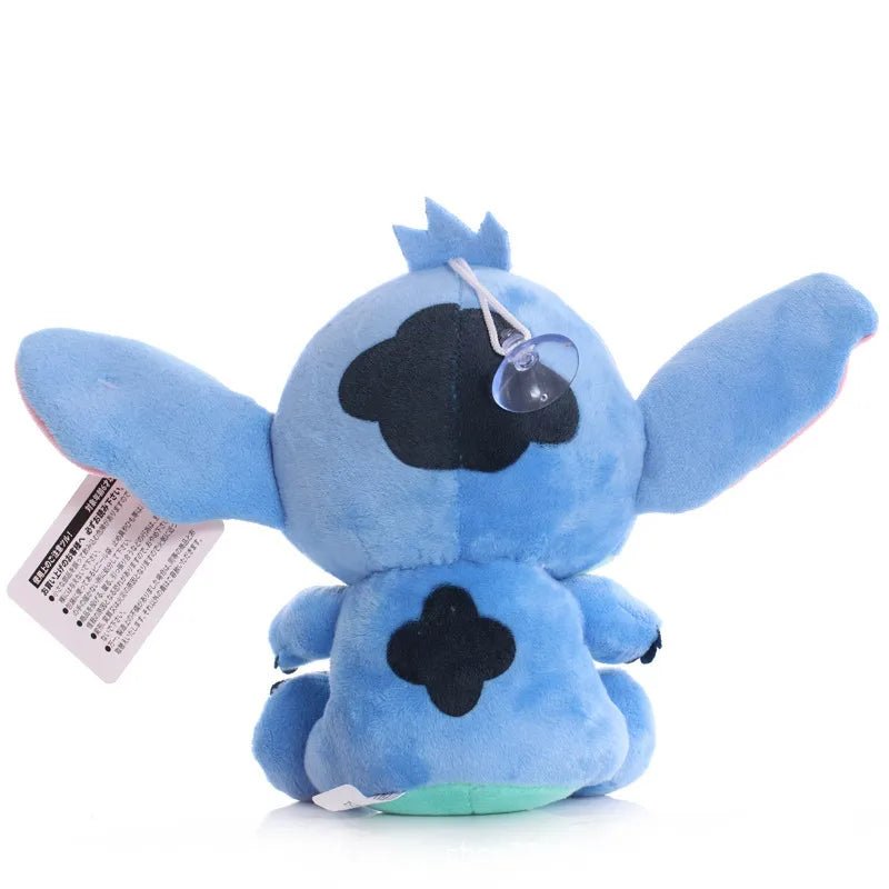 Blue plush toy with a tag