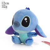 Small blue plush toy with purple accents 