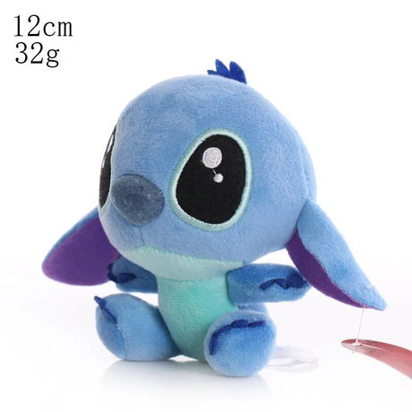 Small blue plush toy with purple accents 