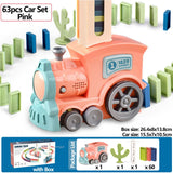 Pink toy train set with dominoes
