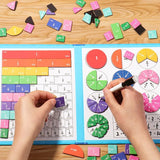 Educational math game with colorful fraction pieces and a worksheet on a wooden table.