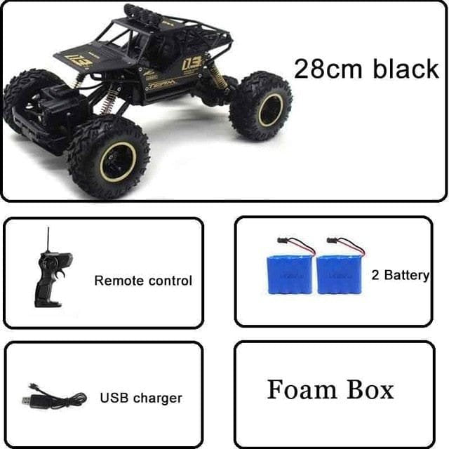 Black RC car with remote control, batteries, and USB charger