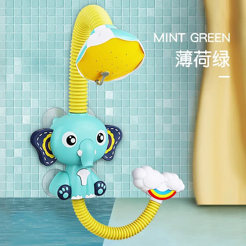 Children's shower toy shaped like an elephant with a yellow hose against a tiled bathroom wall.