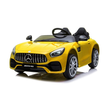 Yellow toy car with Mercedes-Benz logo.