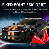 Black and orange drift car with red cones.