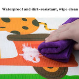 Hand cleaning a colorful mat with a purple cloth, text 'Waterproof and dirt-resistant, wipe clean' above.