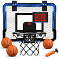 Mini basketball hoop set with digital scoreboard, basketballs, and pump.