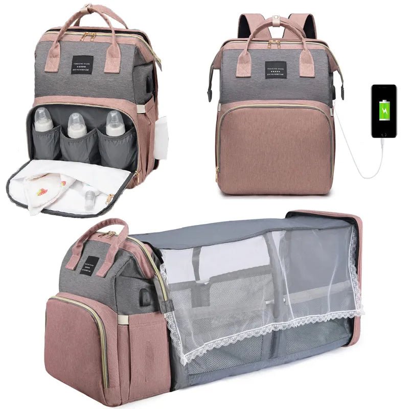 Multifunctional diaper bag with organizer, baby bottles, and USB cable 