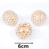 Three spherical objects with a honeycomb pattern.