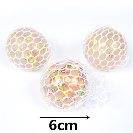 Three spherical objects with a honeycomb pattern.