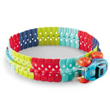 Colorful toy ring with a small vehicle on a white background