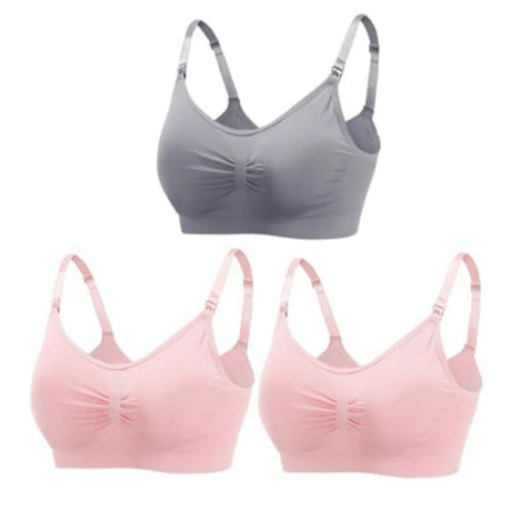 Gray and pink bras on a white background