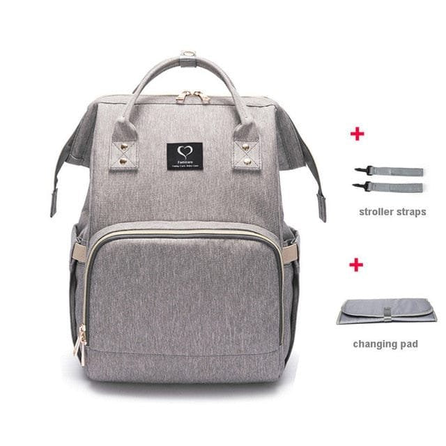Gray backpack with stroller straps and changing pad on a white background
