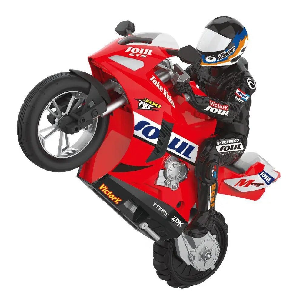 Red motorcycle with a rider in a racing suit 