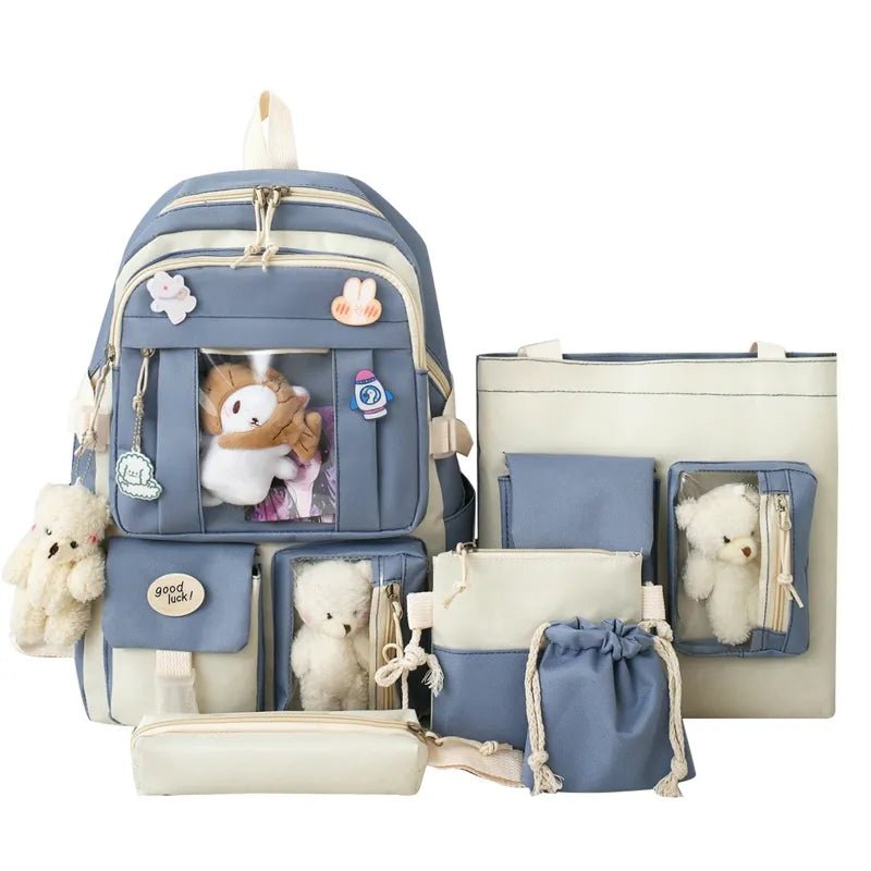 Set of blue and beige bags with teddy bears and plush toys.