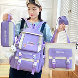 Person wearing a purple backpack with matching pouches and a tote bag, holding a small purple bag.