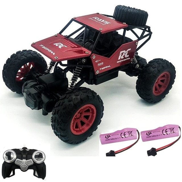 Red and black RC monster truck with remote control and batteries.