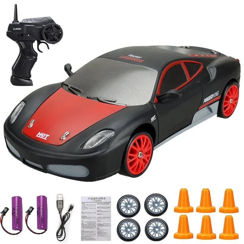 Toy car with remote control, batteries, and accessories.