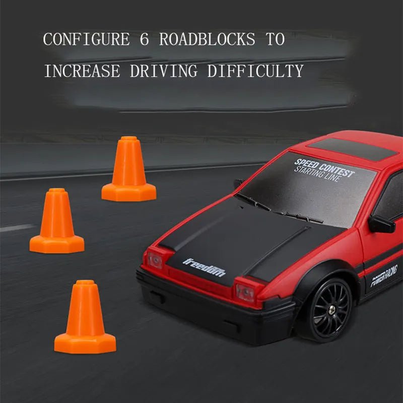Model car with 'Freedom' branding on a track with orange cones and text about configuring roadblocks.
