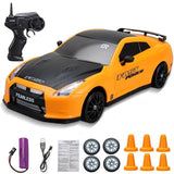 Orange toy car with black hood and 'Fast Power' branding, accompanied by a remote control and accessories.