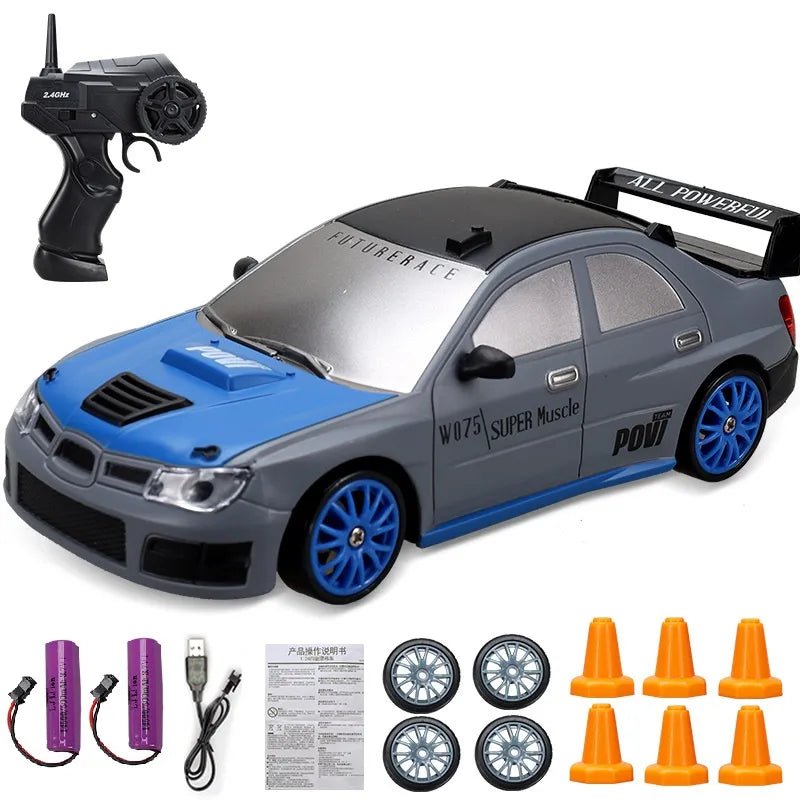 Toy car with remote control, batteries, and accessories.