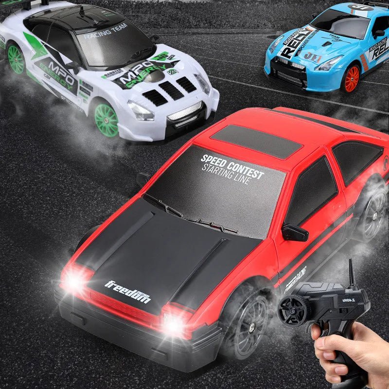 Three remote control cars on a track 