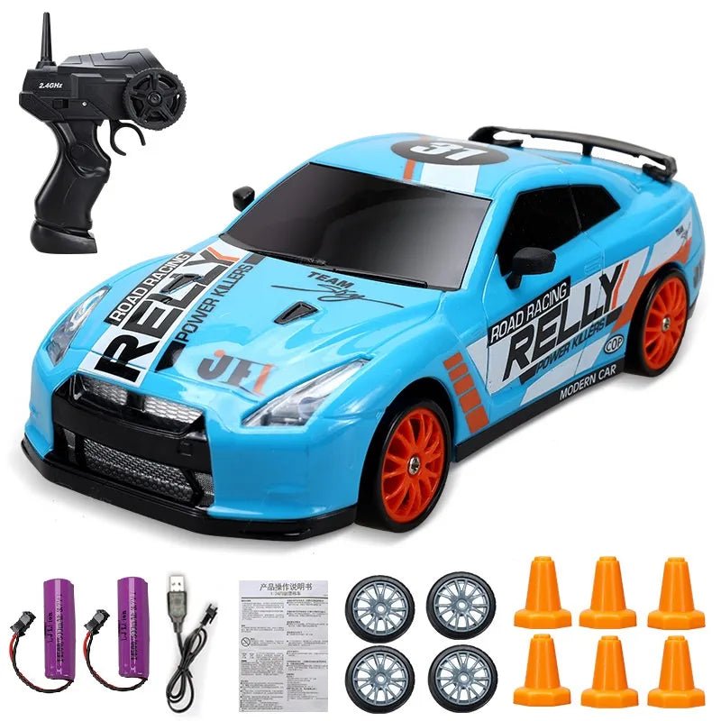 Blue toy race car with remote control, batteries, and accessories