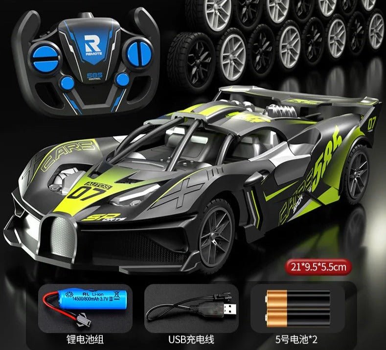 Toy race car with remote control, wheels, battery pack, and USB cable.