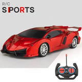 Red sports car model with remote control on a gray background, featuring 'R/C Sports' text.
