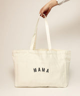 Beige tote bag with 'MAMA' text.