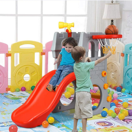 Two children playing with a colorful playset including a slide and basketball hoop.