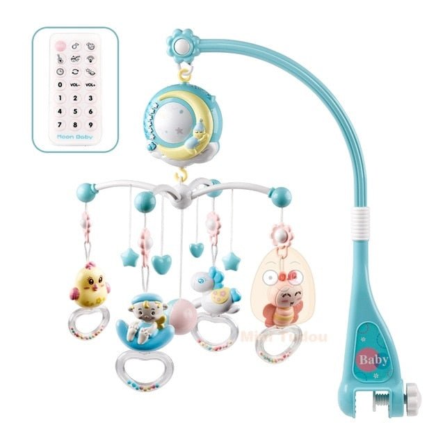 Baby mobile with colorful hanging toys and a remote control.