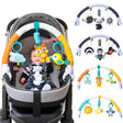 Baby in stroller with colorful carabiner toy attached, featuring various animal designs.